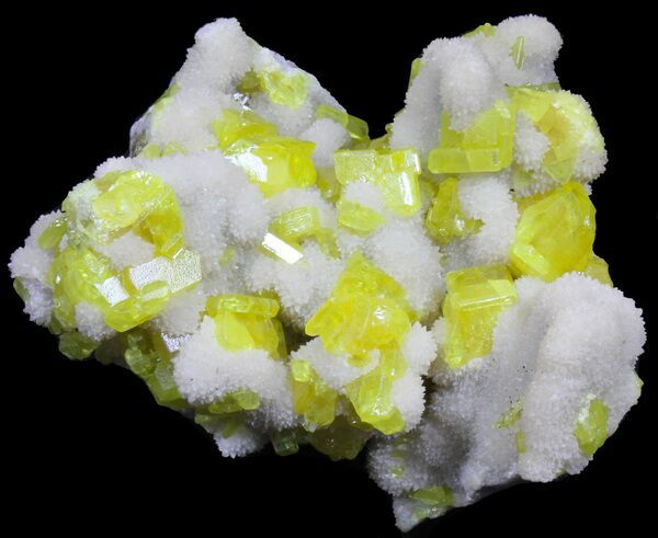 Sulfur crystals on white aragonite from the Cozzodisi Mine in Sicily
